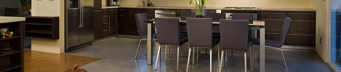 Grey dining room concrete floor